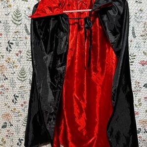 Claire's Vibrant Red and Black Cape